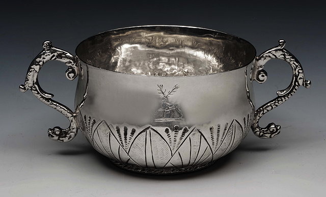 Appraisal: A COMMONWEALTH SILVER PORRINGER OR CAUDLE CUP squat baluster shaped