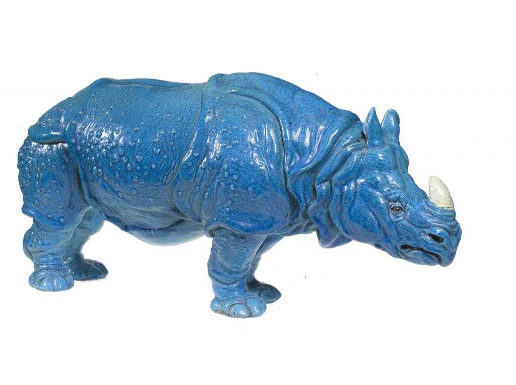 Appraisal: AN ITALIAN TIN GLAZED EARTHENWARE MODEL OF A RHINOCEROS painted