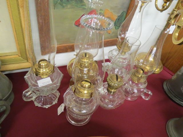 Appraisal: Antique Oil Lamps all chamberstick style with burners and chimneys