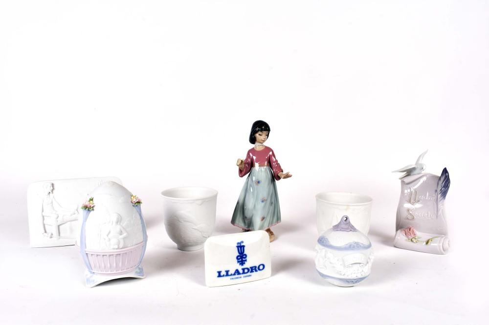 Appraisal: EIGHT LLADRO MISCELLANEOUS ITEMSComprising Three Banners or Scrolls one molded