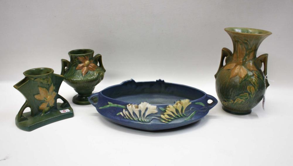 Appraisal: FOUR ROSEVILLE ART POTTERY VESSELS Clematis pattern vases of various