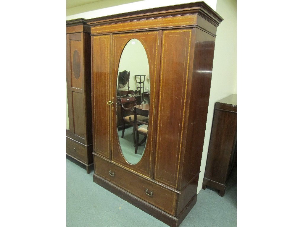 Appraisal: Edwardian mahogany inlaid mirror door wardrobe