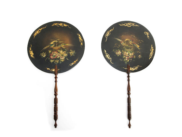 Appraisal: A pair of th century papier mache face screens Each