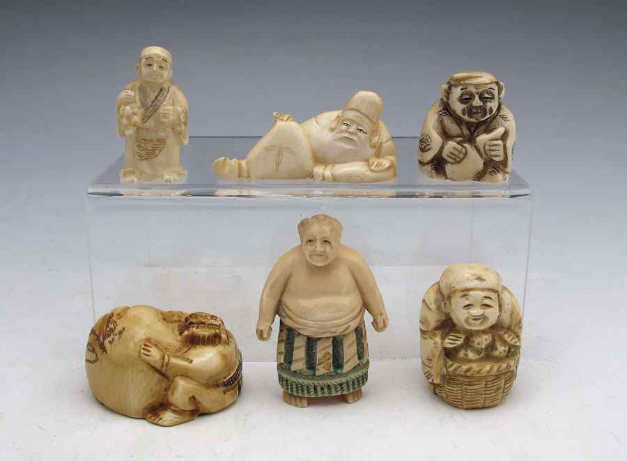 Appraisal: COLLECTION OF IVORY AND BONE NETSUKE To include Ivory Demon