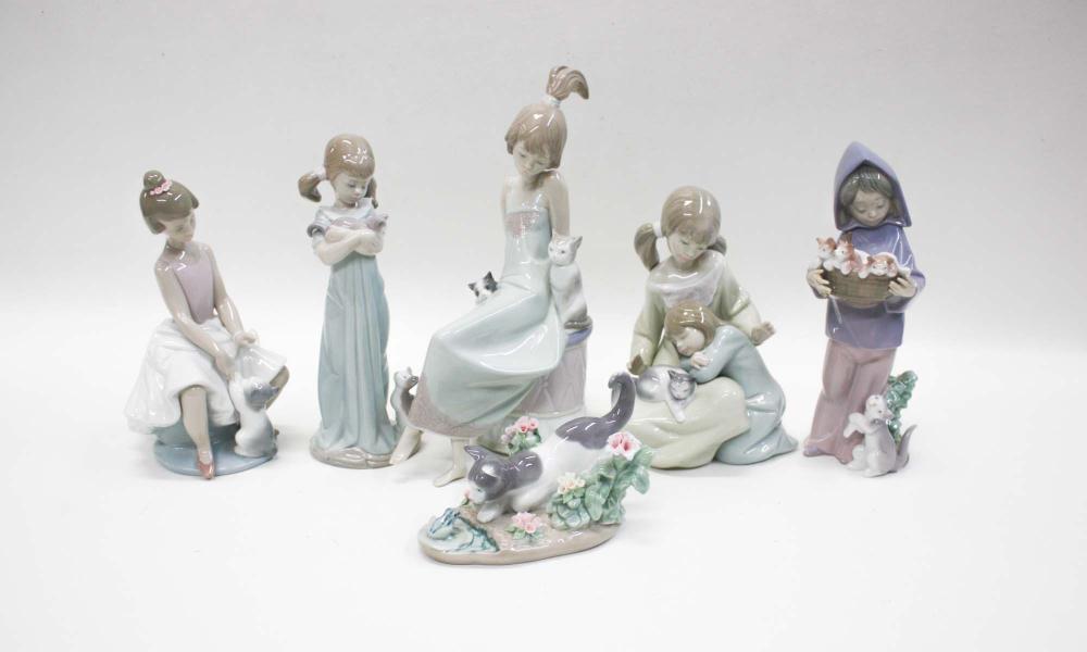 Appraisal: SIX LLADRO PORCELAIN FIGURINES Kitty Confrontation sculptor Juan Huerta Little