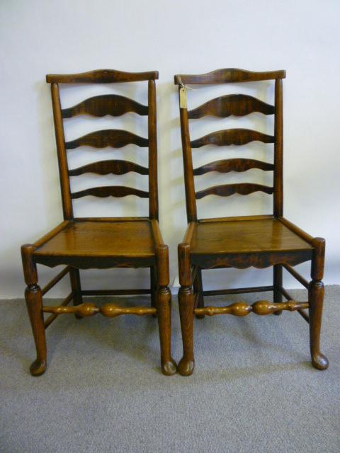 Appraisal: A PAIR OF ASH AND ELM LADDER BACK SIDE CHAIRS