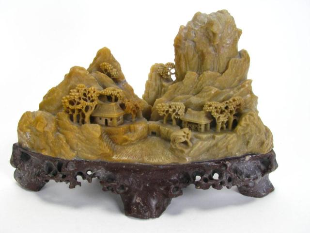 Appraisal: Carved Chinese soapstone sculpture depicting a mountainside village measures approximately