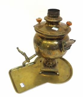 Appraisal: Samovar A brass samovar incomplete with a copper under plate