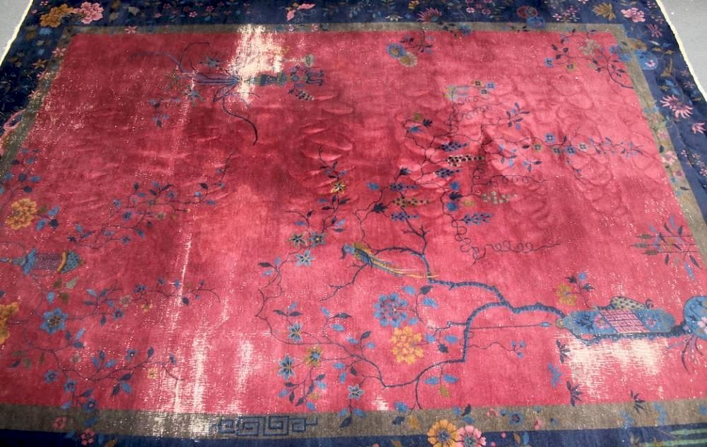 Appraisal: Chinese Art Deco rug in blue with red A Chinese