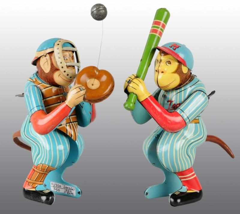 Appraisal: Lot of Tin Monkey Baseball Player Wind-Up Toys Description Japanese