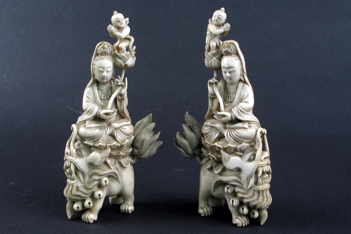 Appraisal: PAIR IVORY HAND CARVED FIGURES OF QUAN YIN seated on