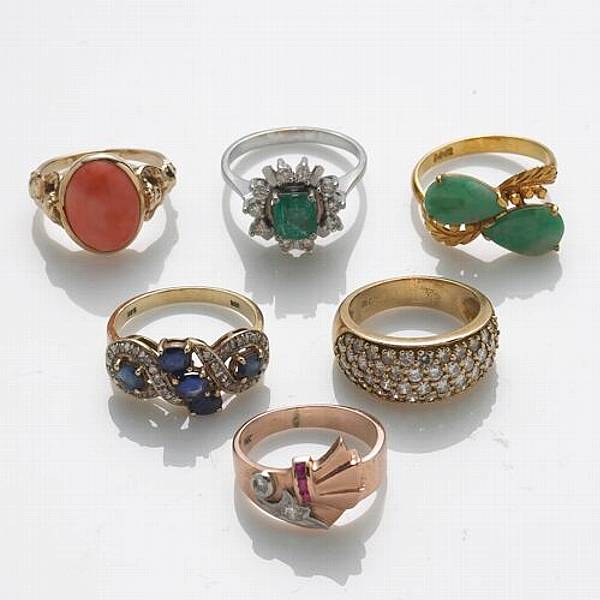 Appraisal: A collection of six diamond sapphire ruby emerald coral jade