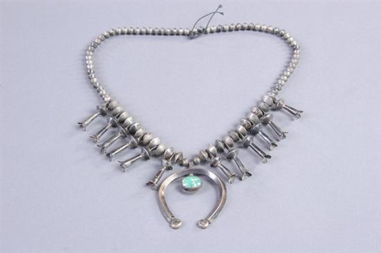 Appraisal: NAVAJO TURQUOISE AND STERLING SILVER SQUASH BLOSSOM NECKLACE Circa s