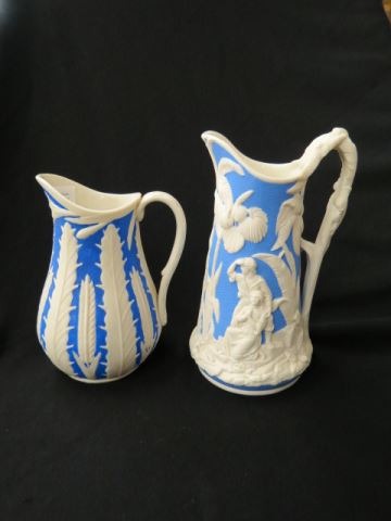 Appraisal: English Relief Pitchers mid th century blue white one wheat