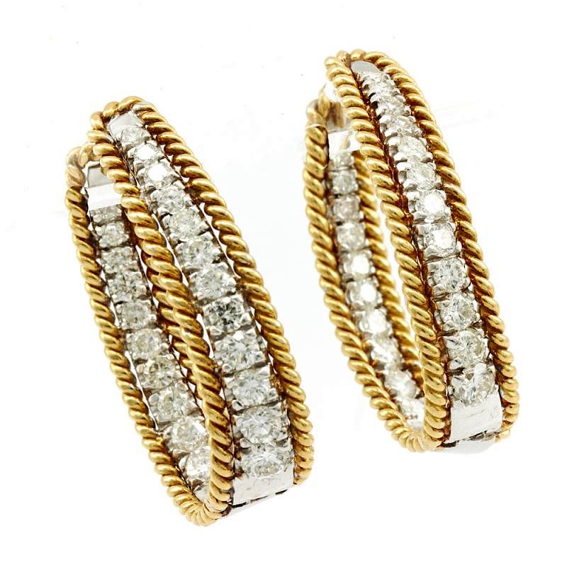 Appraisal: k Yellow and white gold hinged diamond hoop earrings k