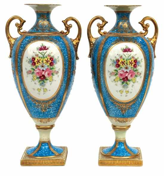 Appraisal: A pair of gilded porcelain cabinet vases Each of almond