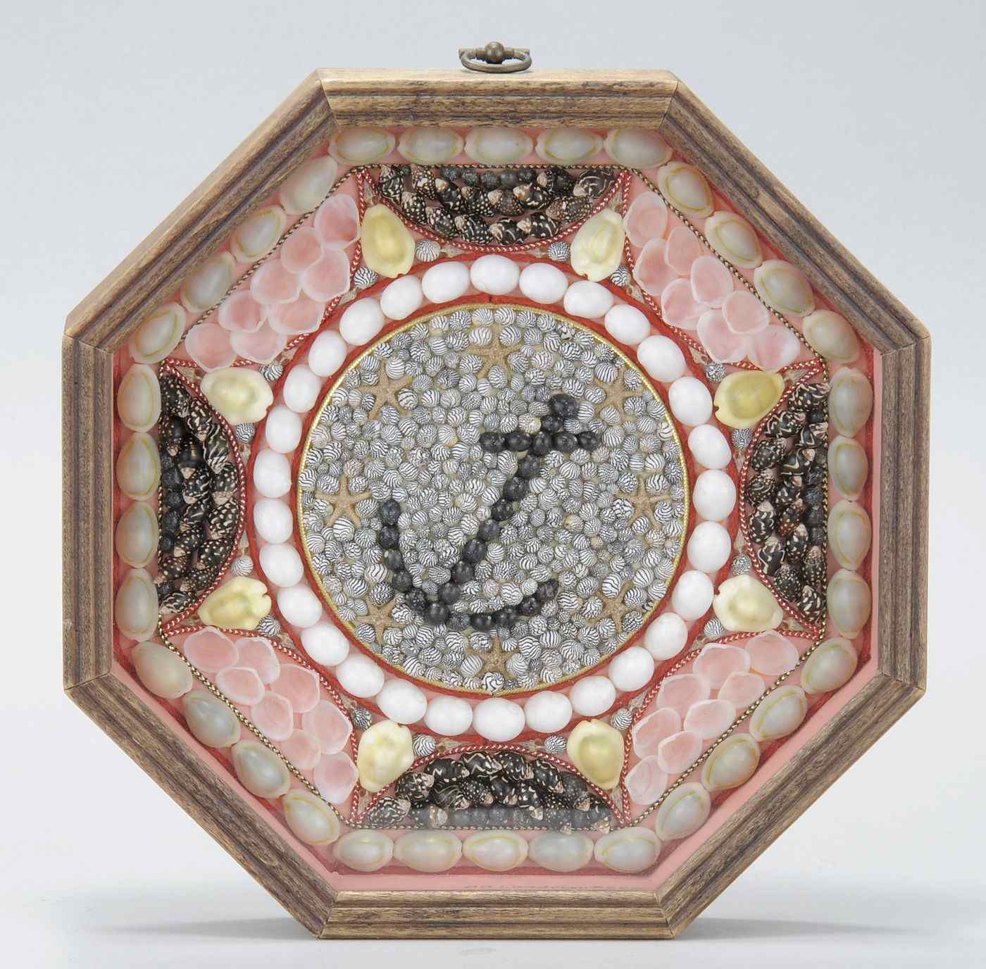 Appraisal: FRAMED OCTAGONAL SHELLWORK VALENTINE BY BERNARD WOODMANMulticolor geometric shellwork design