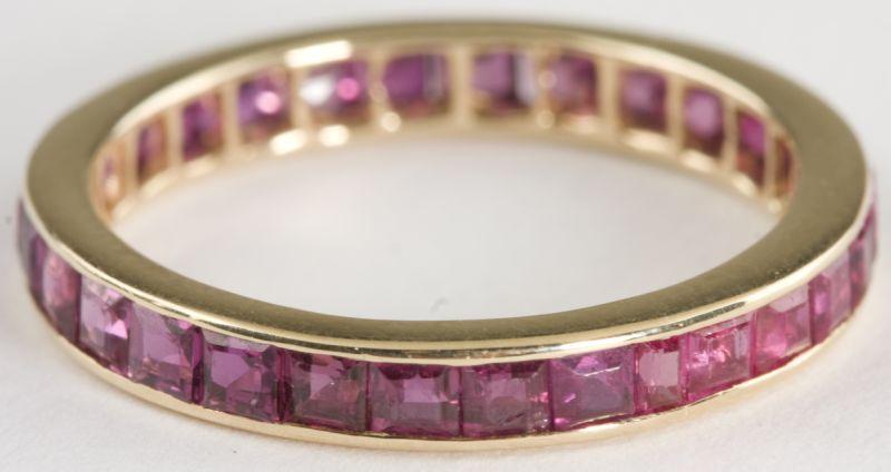 Appraisal: KT Ruby Baguette Eternity Band with square cut rubies ct