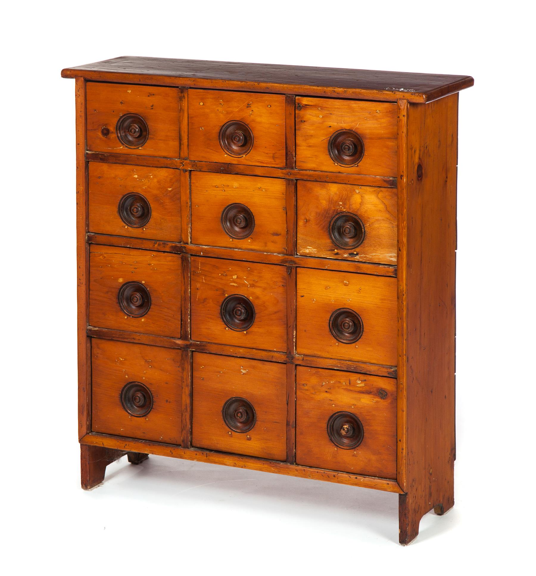 Appraisal: TWELVE-DRAWER APOTHECARY CHEST American late th century pine Solid ends