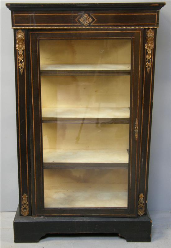 Appraisal: Victorian ebonised cabinet with gilt metal mounts single glazed door