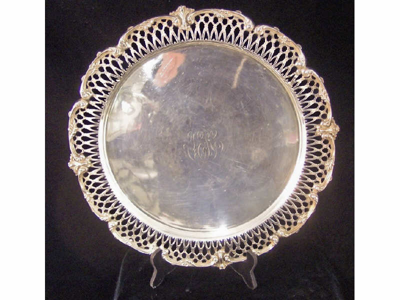 Appraisal: Sterling Round Tray Pierced edge round tray with scrolled work