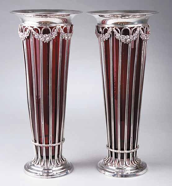 Appraisal: A Pair of Adam-Style Silverplate Trumpet Vases the flared rims