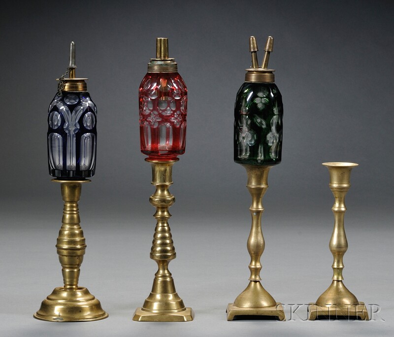 Appraisal: Three Colored Glass Cut Overlay Peg Lamps and Four Brass