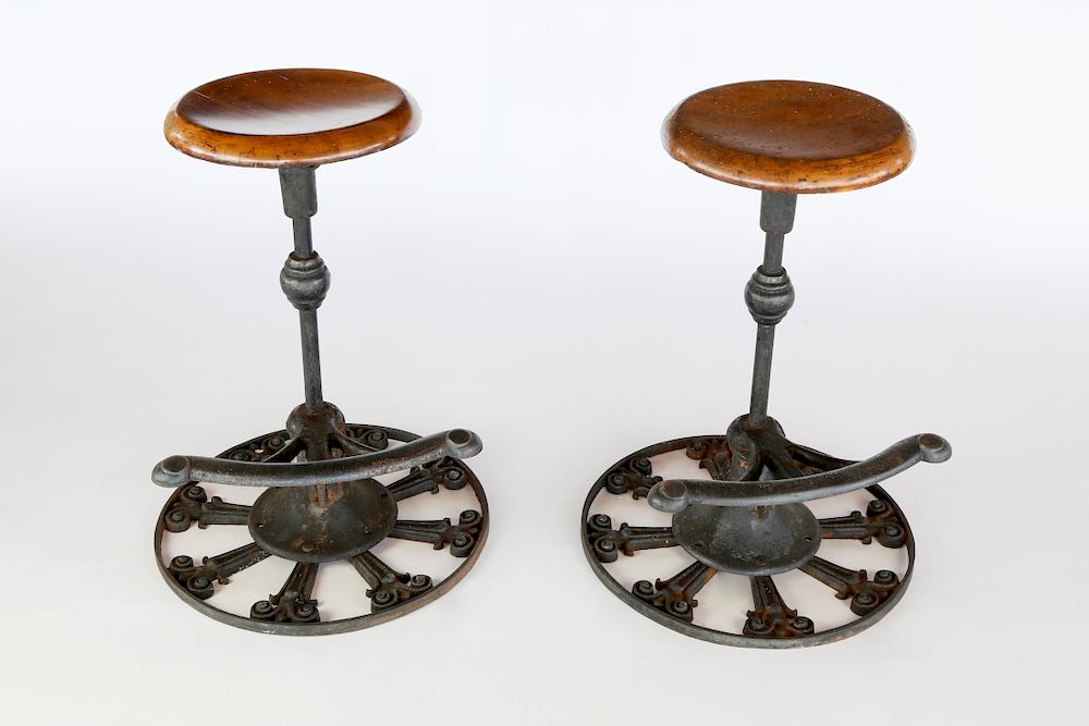 Appraisal: Pair of Cast Iron and Walnut Swivel Stools Exclusive on