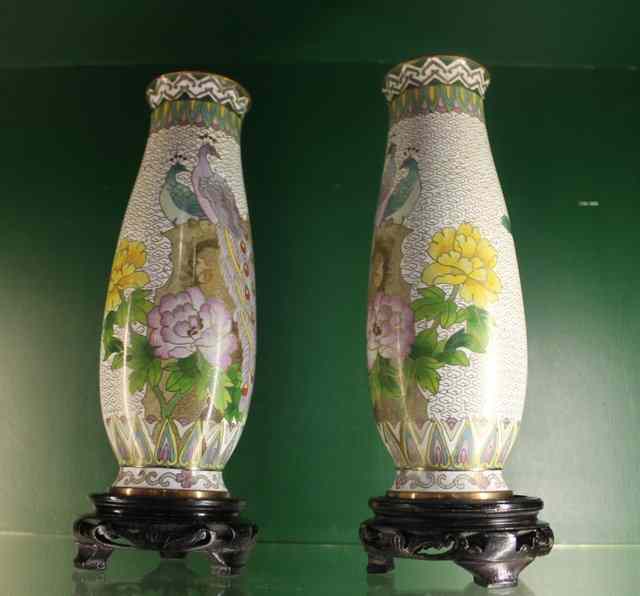 Appraisal: A PAIR OF CONTEMPORARY CLOISONNE VASES decorated with peacocks on