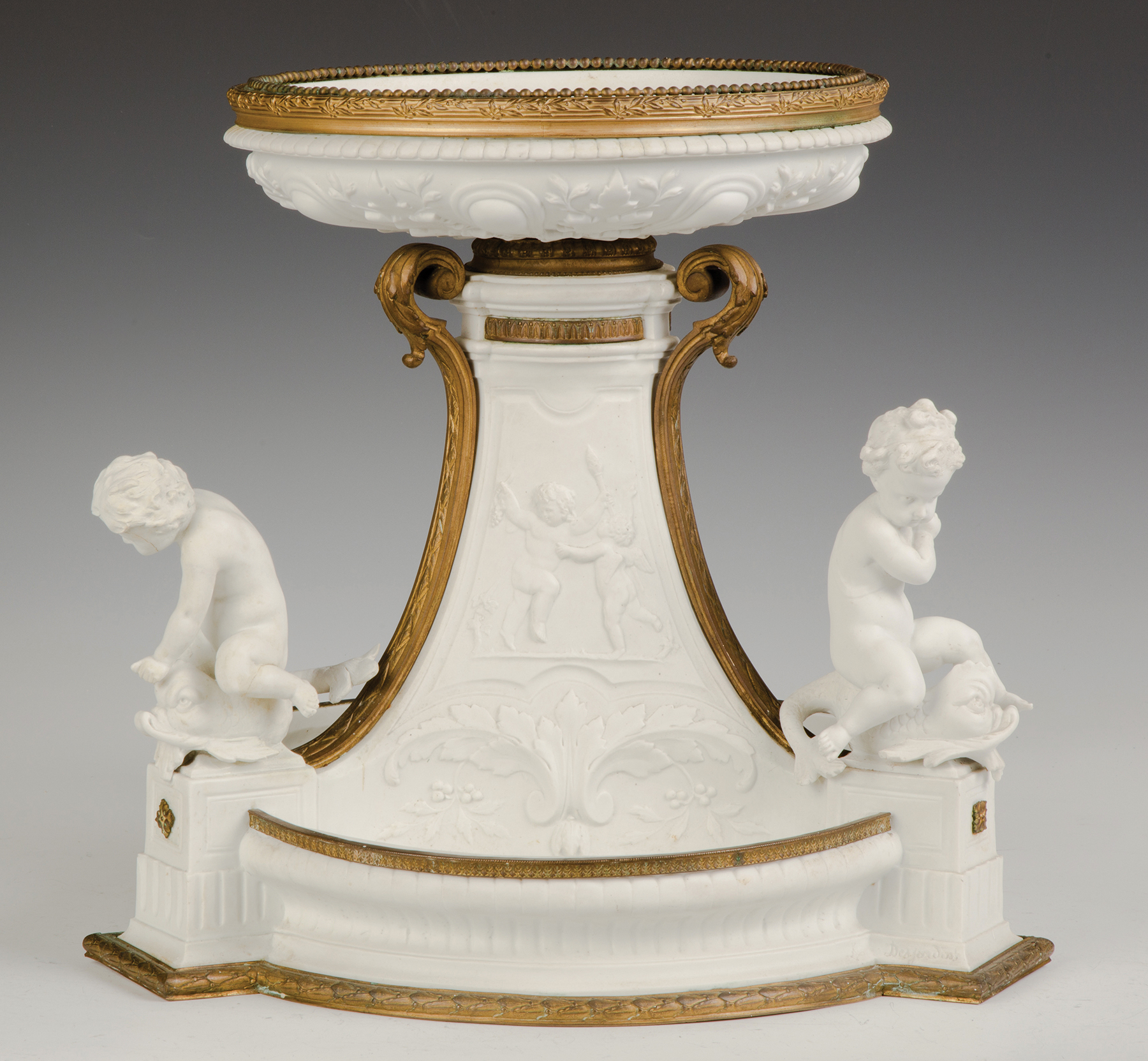 Appraisal: Porcelain and Gilt Bronze Centerpiece with Cherubs and Putti th