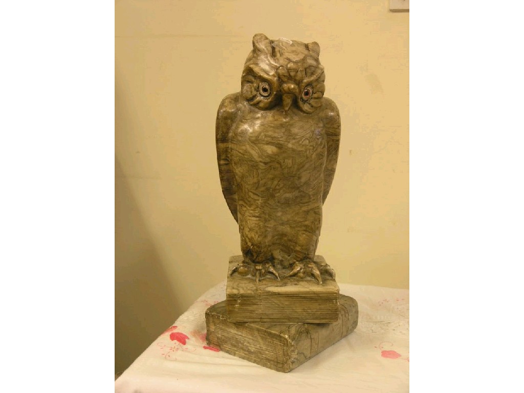 Appraisal: A large carved stone owl model signed B Koch the