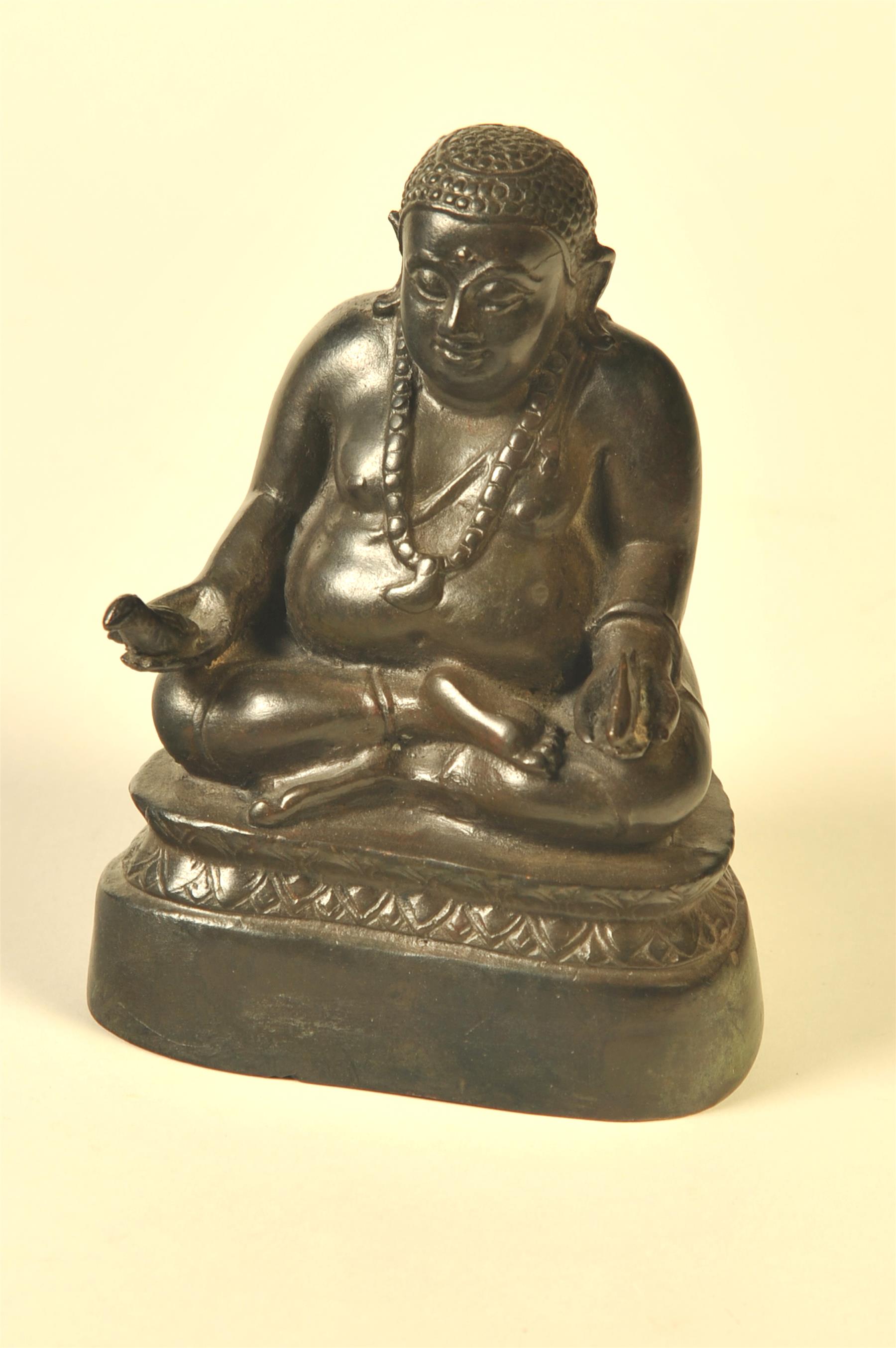 Appraisal: BRONZE SEATED BUDDHA Asian th century Nicely detailed with palms