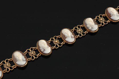 Appraisal: A cameo bracelet Comprising seven carved oval shell cameos depicting