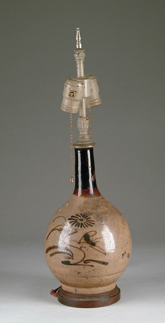 Appraisal: ORIENTAL STYLE LAMP The bulbous vase mounted as lamp in