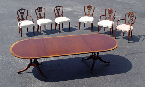 Appraisal: KAPLAN BEACON HILL COLLECTION BANDED MAHOGANY DINING TABLE AND CHAIRS