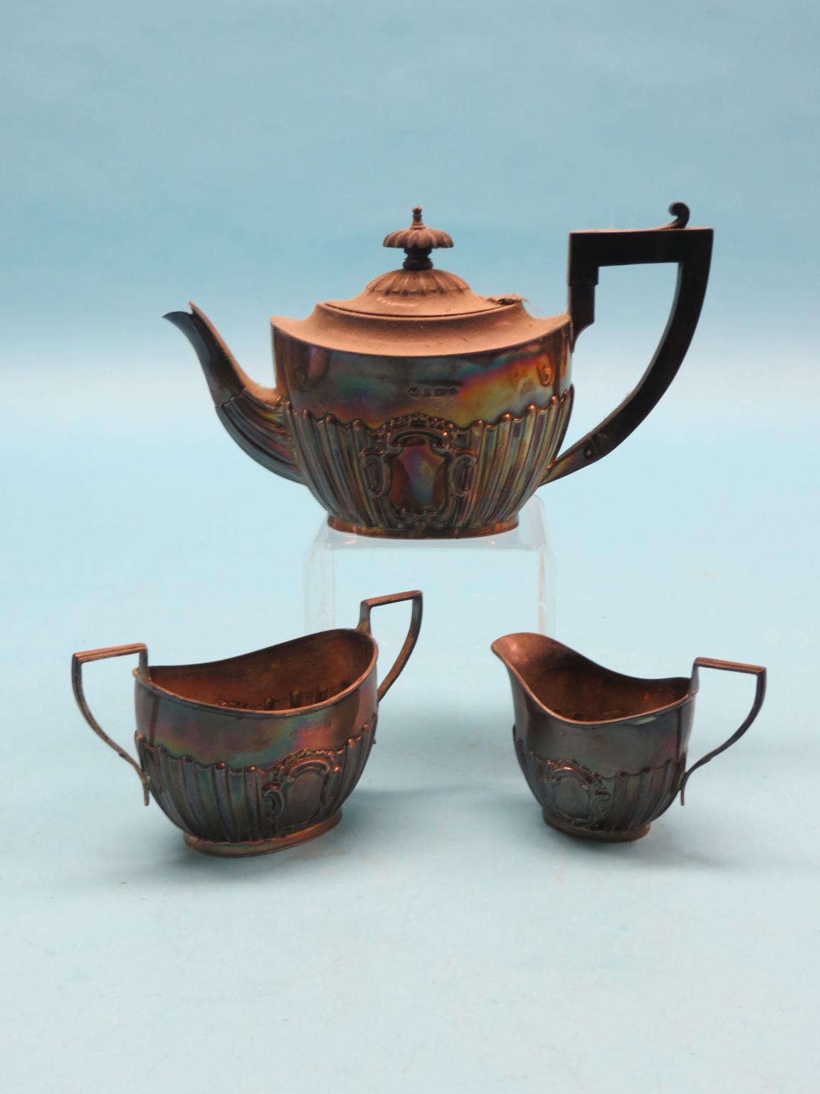 Appraisal: A small Edward VII silver teaset teapot two-handled sugar bowl