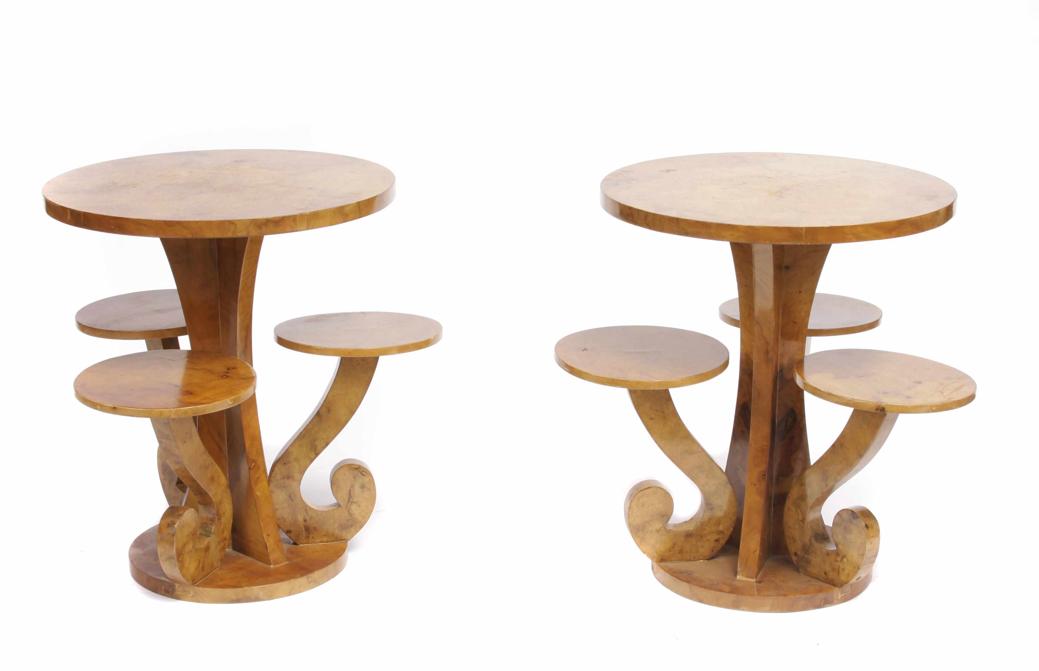 Appraisal: A pair of Art Deco style maple tiered tables height