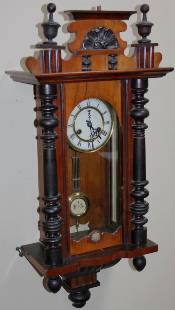 Appraisal: A late thC walnut and ebonised Vienna wall clock the