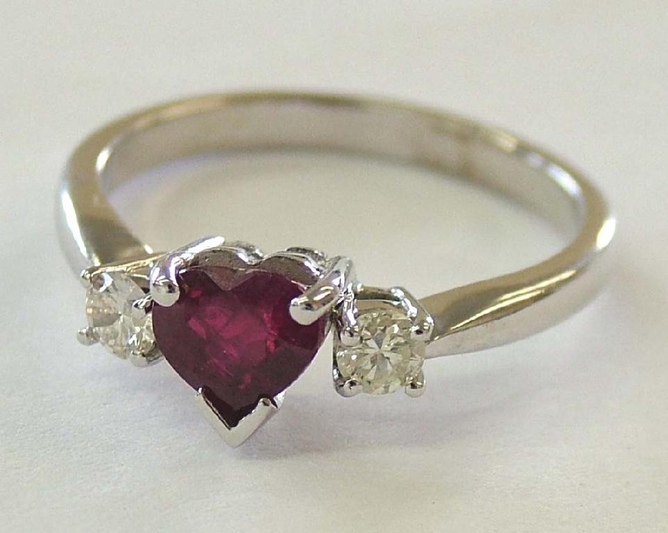 Appraisal: ct white gold heart shaped ruby and diamond three stone