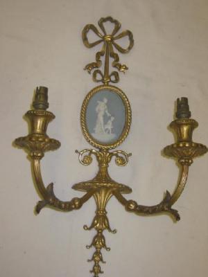 Appraisal: A PAIR OF FRENCH GILT METAL WALL LIGHTS in the