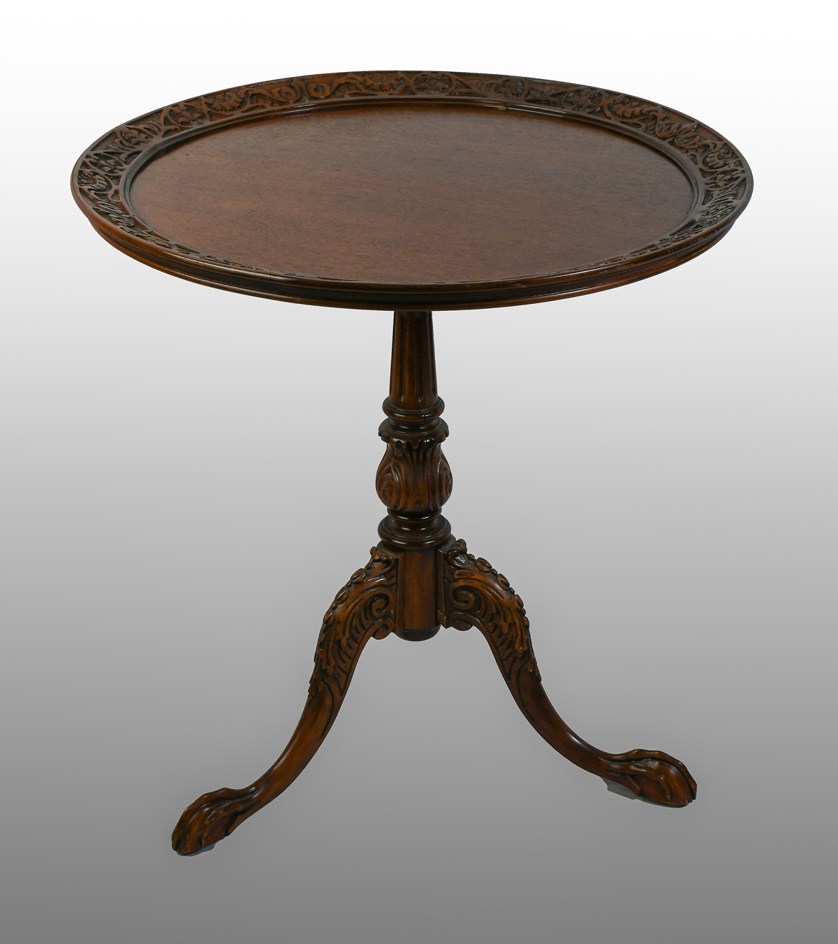 Appraisal: CARVED CHIPPENDALE STYLE TEA TABLE Top with a carved foliate