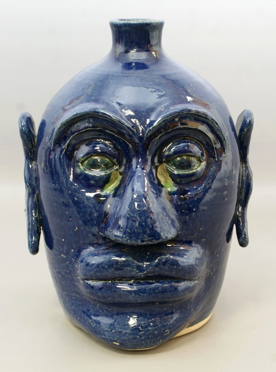 Appraisal: Edwin Meaders cobalt blue pottery face jug tall dated -