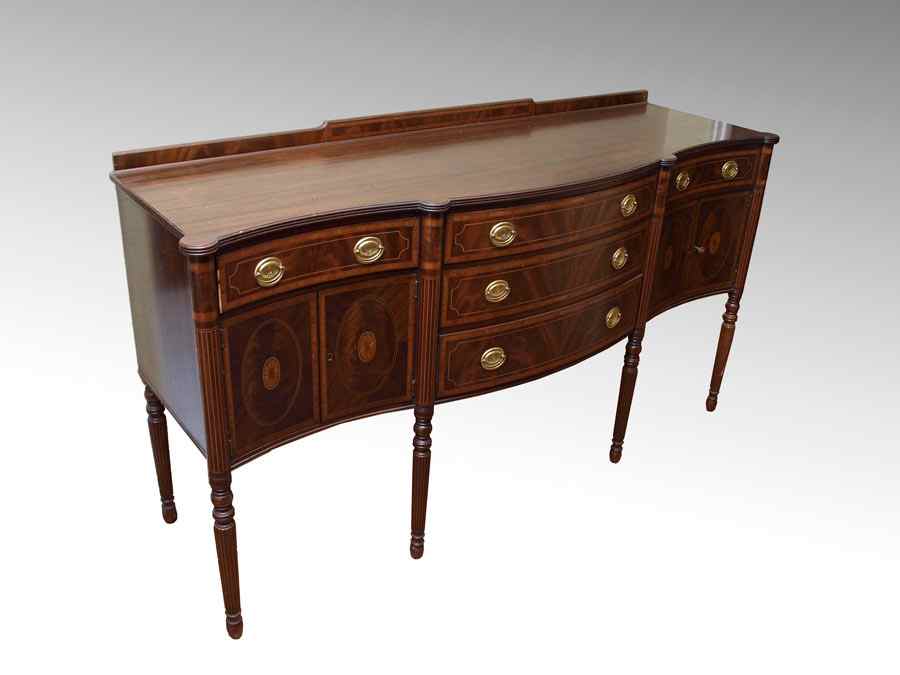 Appraisal: HEPPLEWHITE STYLE BANDED MAHOGANY SIDEBOARD Inlaid backsplash shaped top with