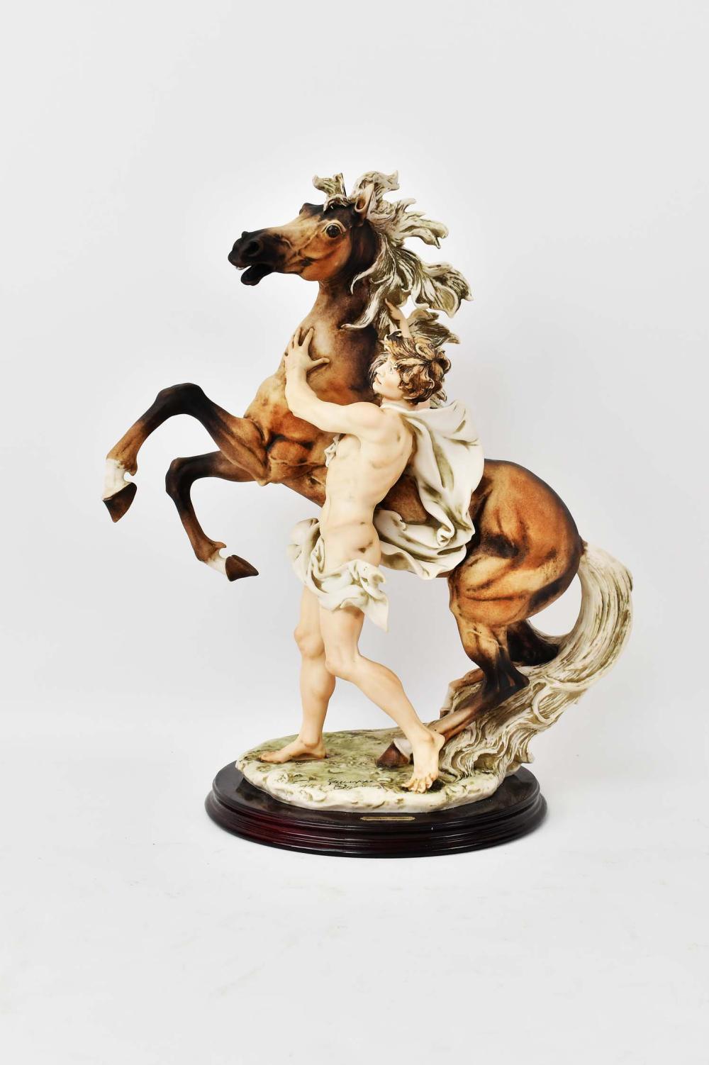 Appraisal: GUISEPPI ARMANI PORCELAIN MAN AND HORSETitled Freedom Height in Width