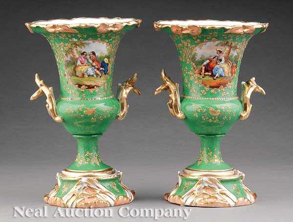 Appraisal: A Pair of Paris Porcelain Gilt and Polychrome Urns c