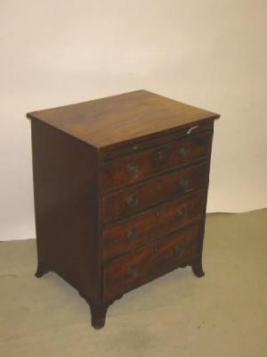 Appraisal: A SMALL MAHOGANY CHEST of four graduated drawers with ebony