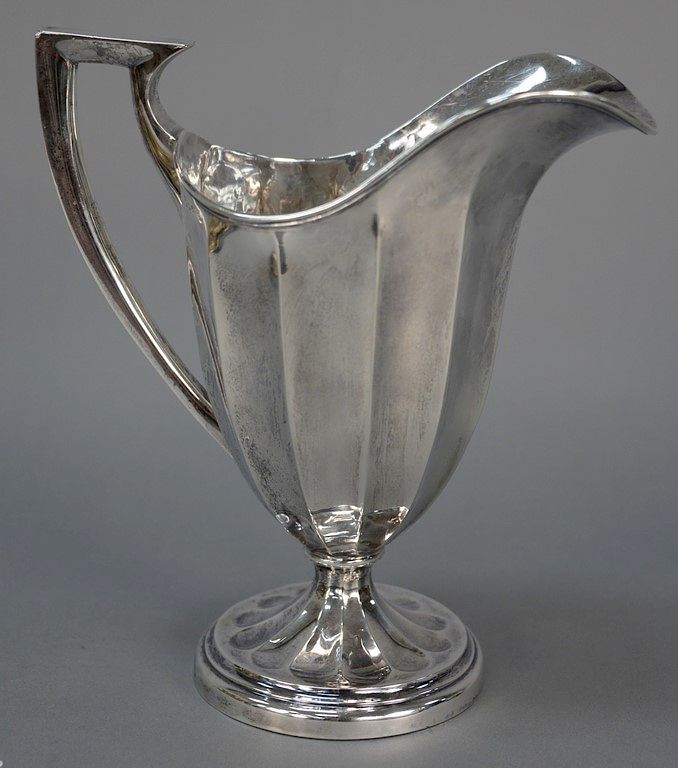 Appraisal: English silver pitcher having fluted body on round base height