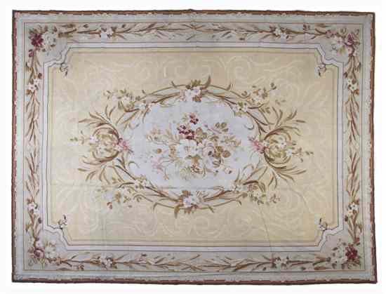 Appraisal: An Aubusson Style Wool Rug Stark having a foliate oval