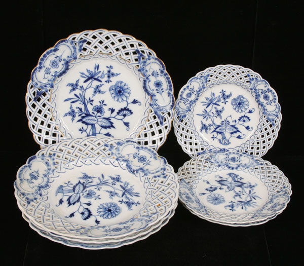 Appraisal: Meissen porcelain blue onion dishes all with reticulated borders four