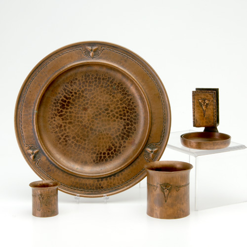 Appraisal: ROYCROFT Hammered copper five-piece smoking set in the Trillium pattern